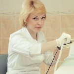 Female doctor coloproctologist