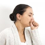 Woman coughing